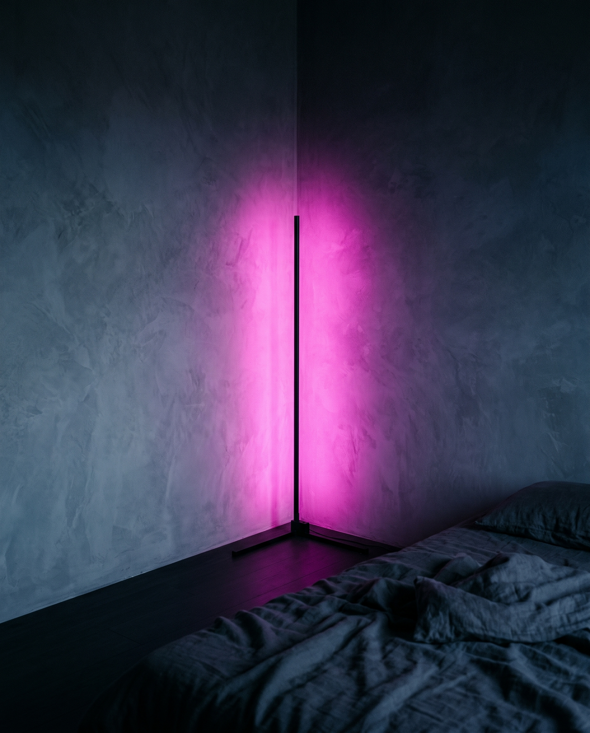 Corner Floor Lamp washing a bedroom corner in magenta