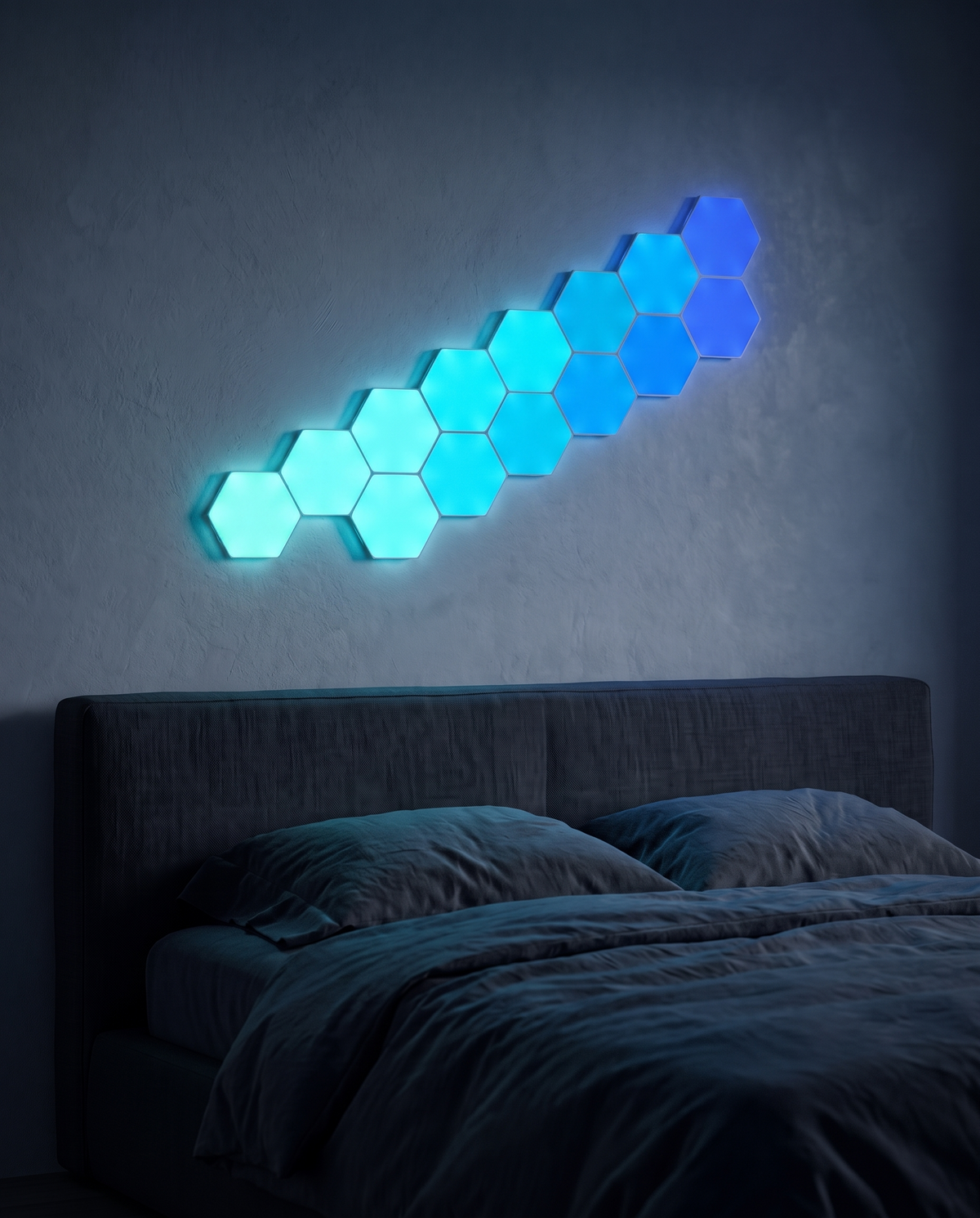 Hexagon Light Panels in a diagonal cluster above a bed, glowing cyan and blue